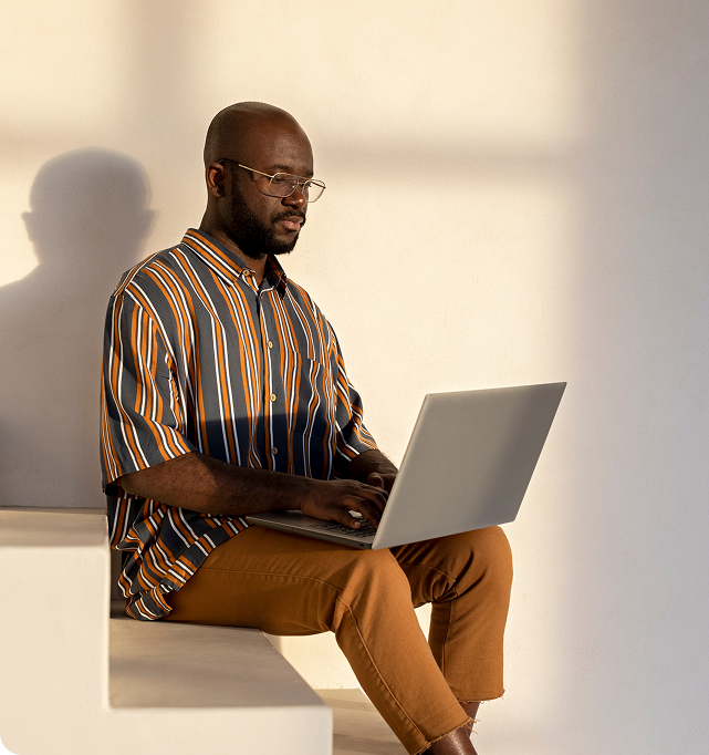 Ghecs team members collaborating in a modern office